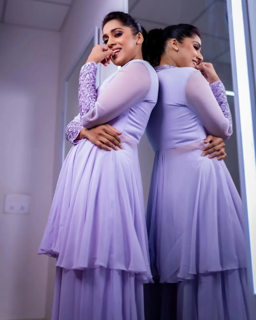 ETV Anchor Rashmi Gautam Photos In Violet Gown